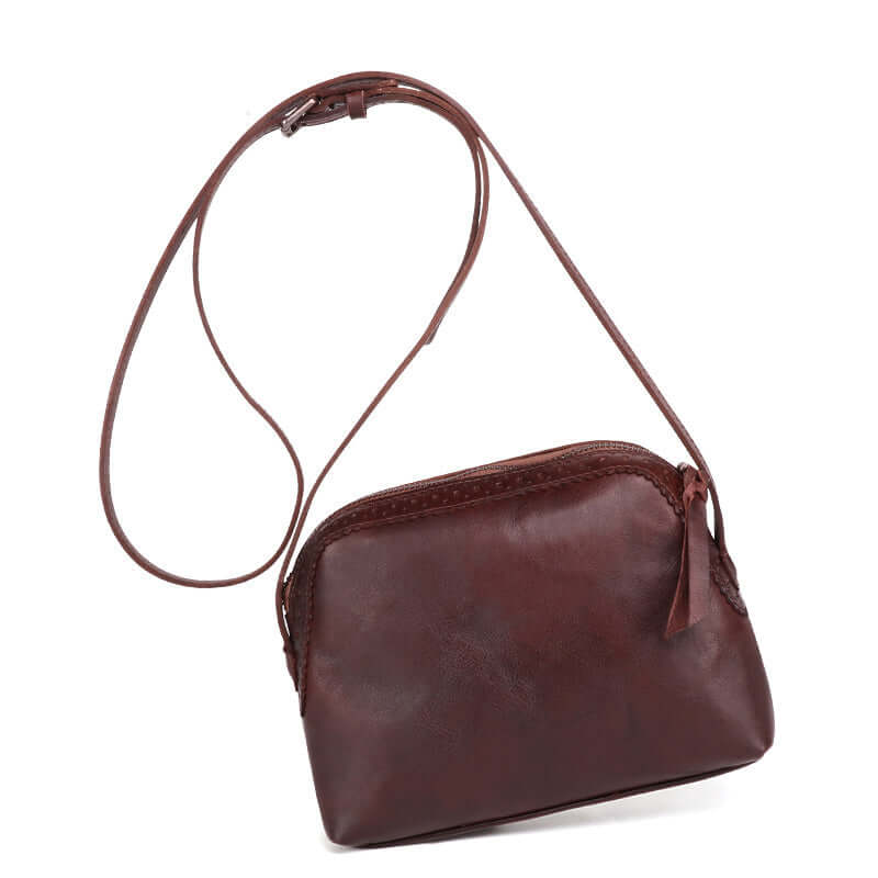 A dark brown leather crossbody bag