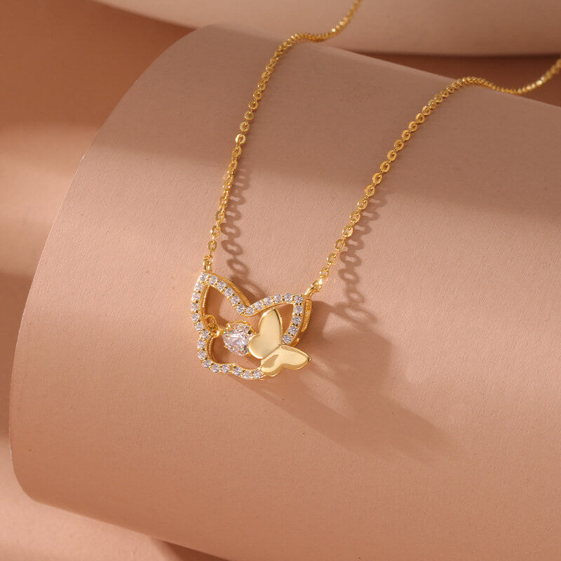 Gold chain necklace with butterfly pendant