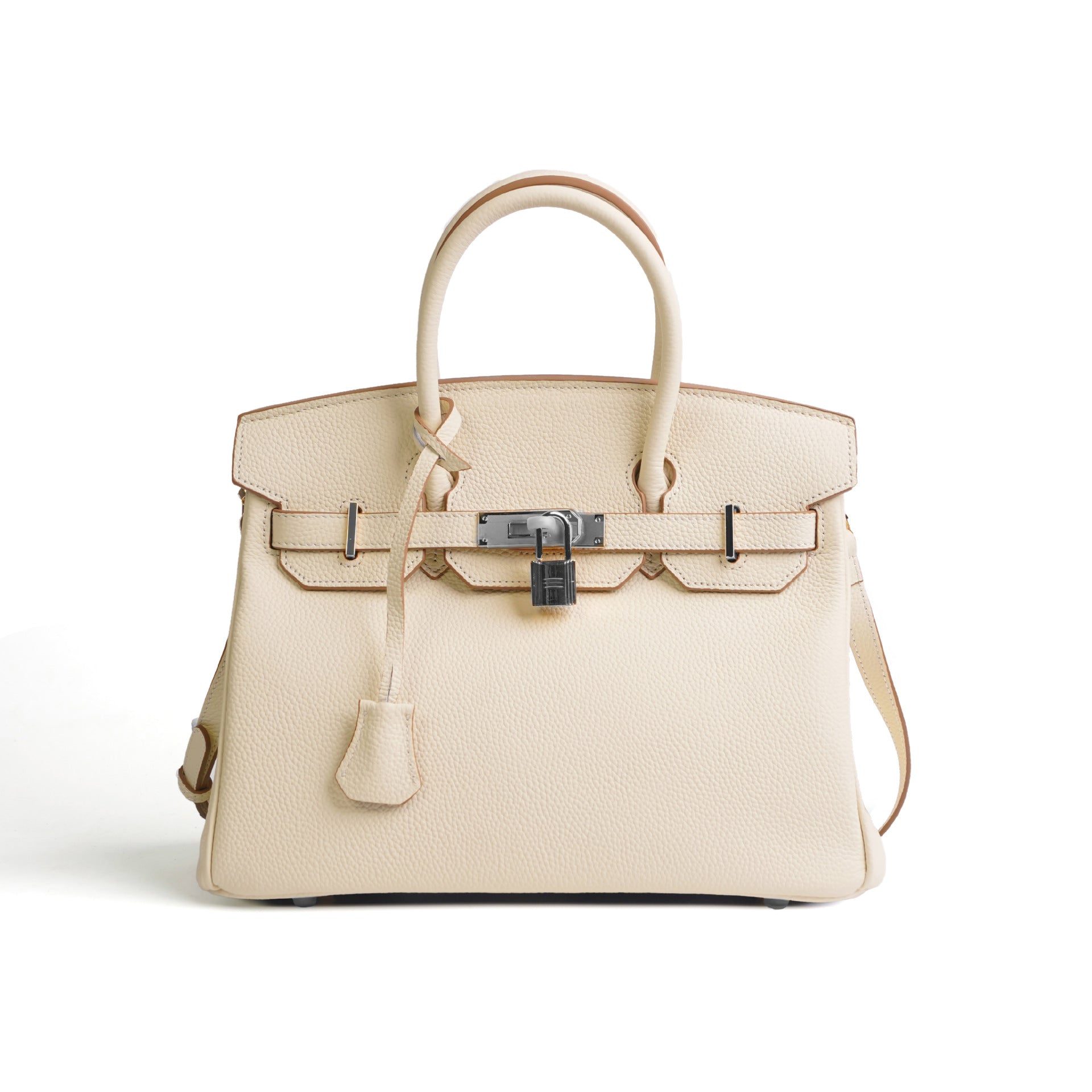 Beige handbag with a lock on a white background