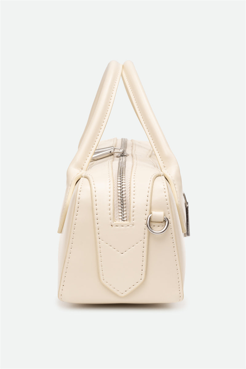 Beige handbag with a zipper on a white background