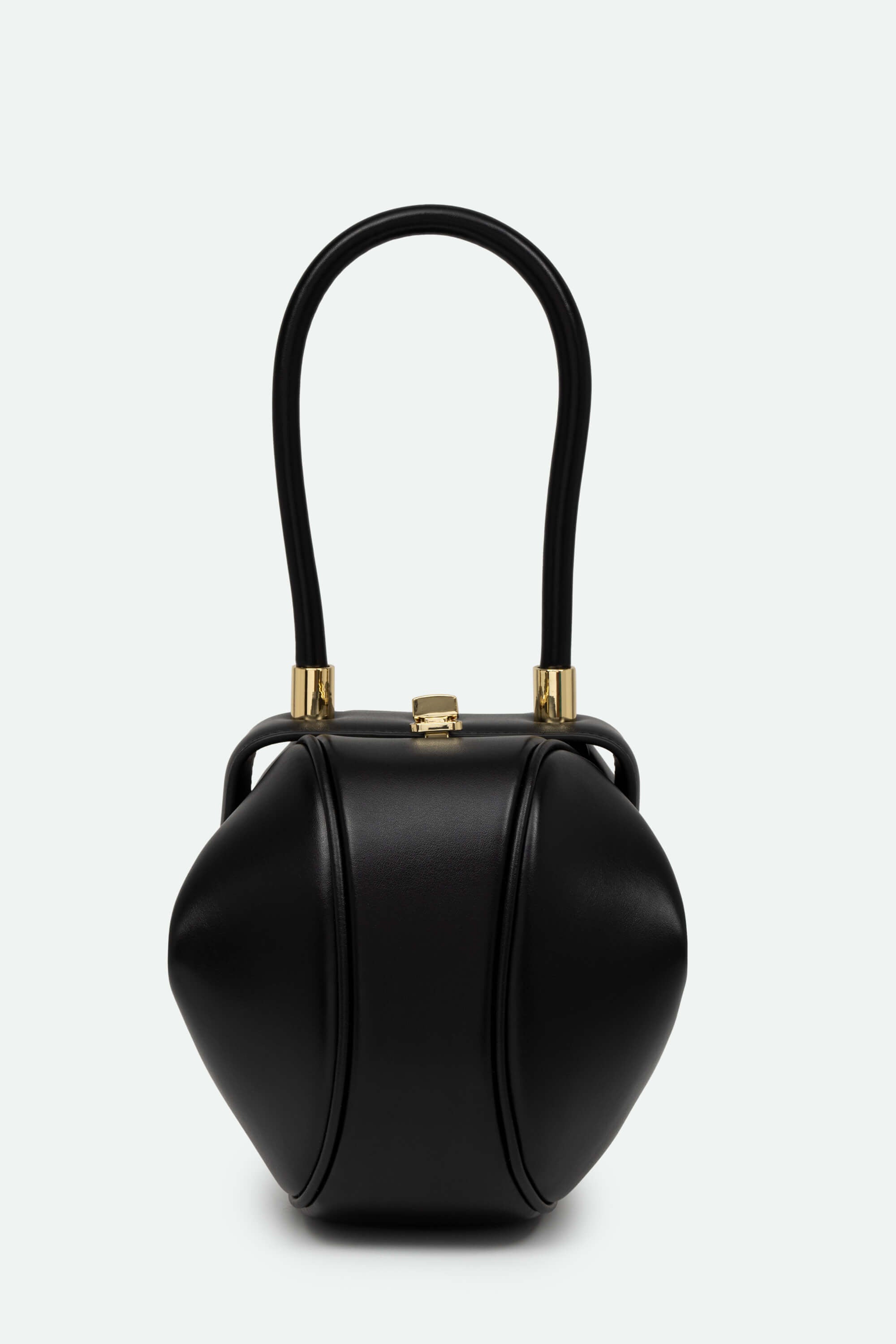 Black handbag with gold accents on a white background