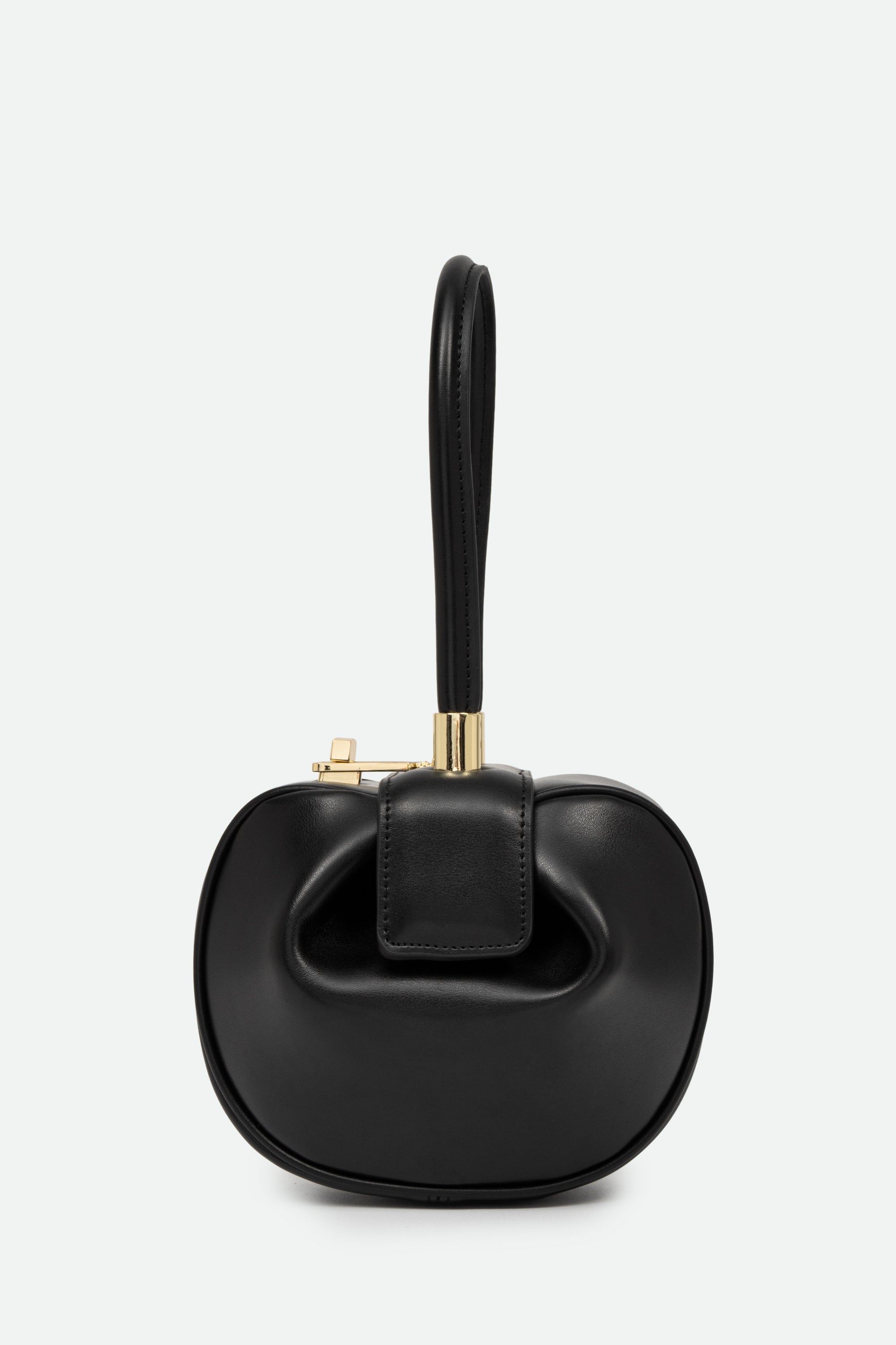 Black handbag with gold clasp on a white background