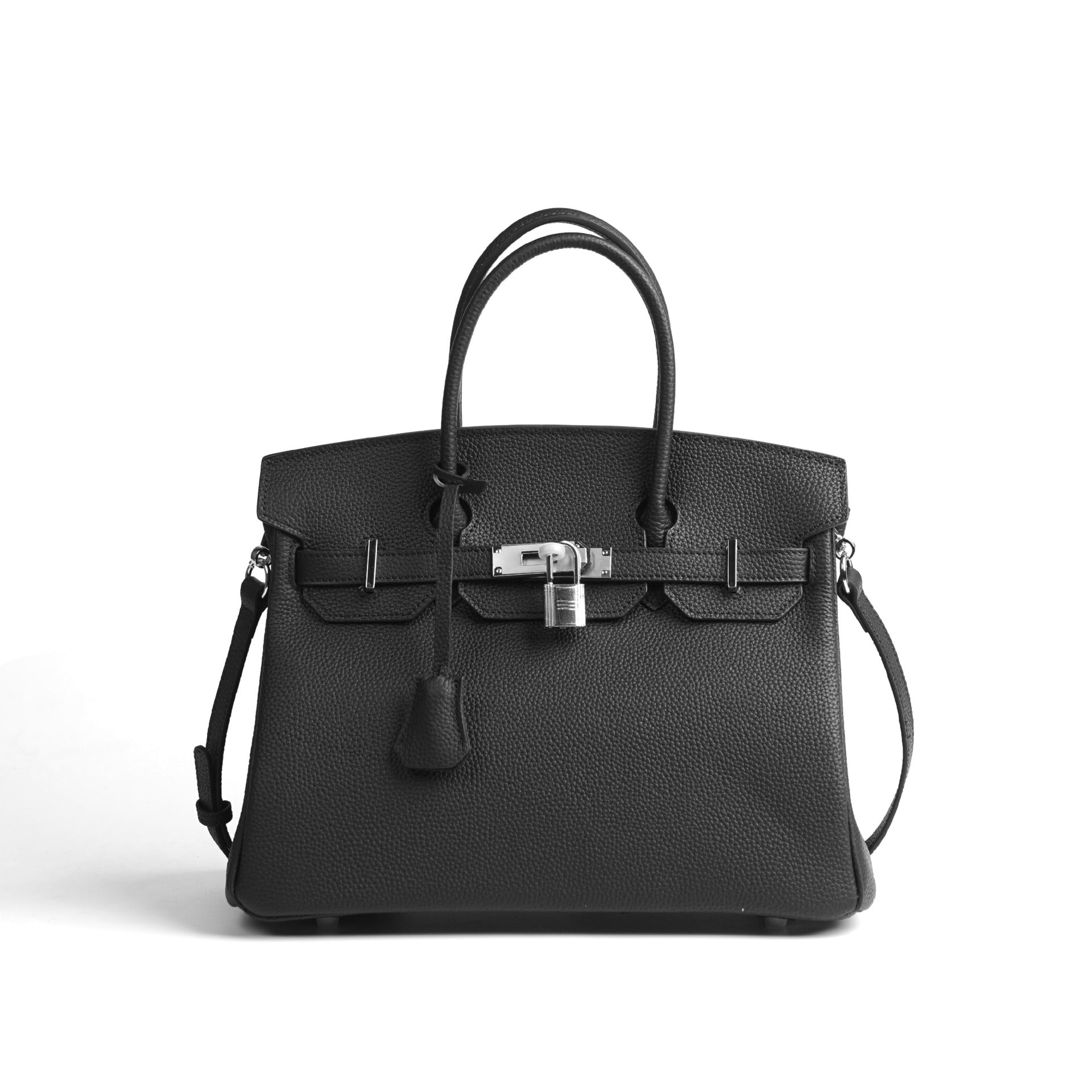 Black handbag with silver hardware on a white background
