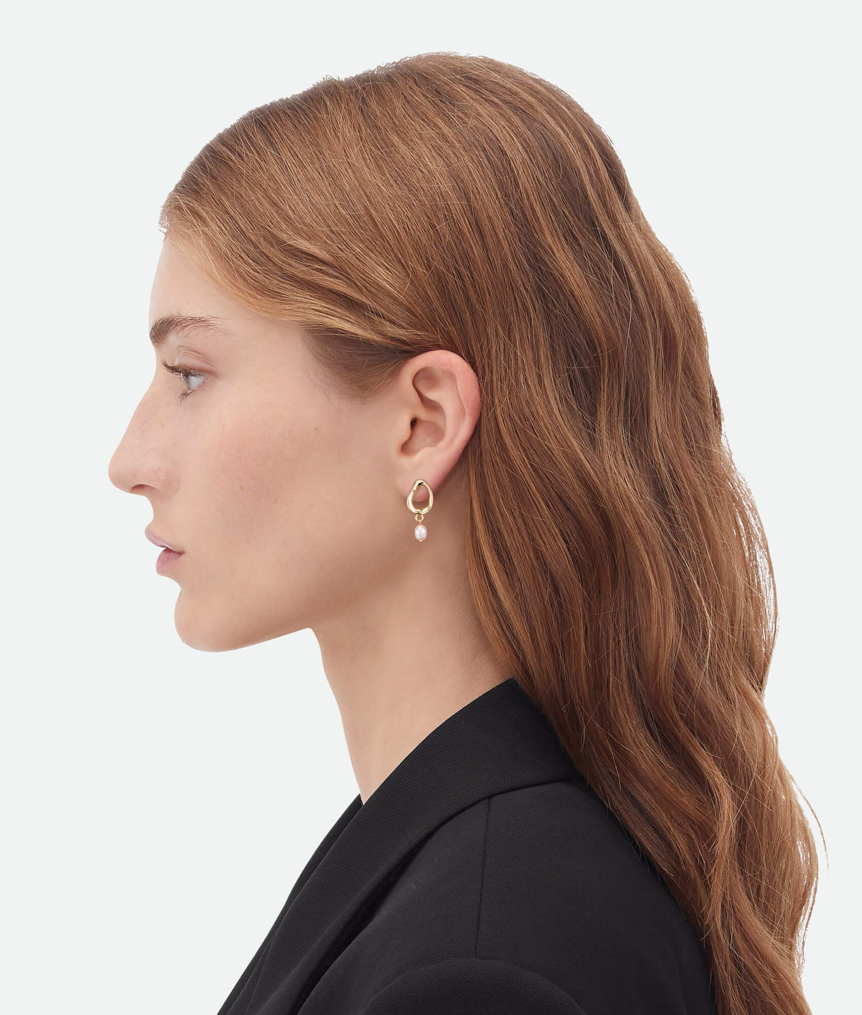 Model wearing fresh water pearl earrings