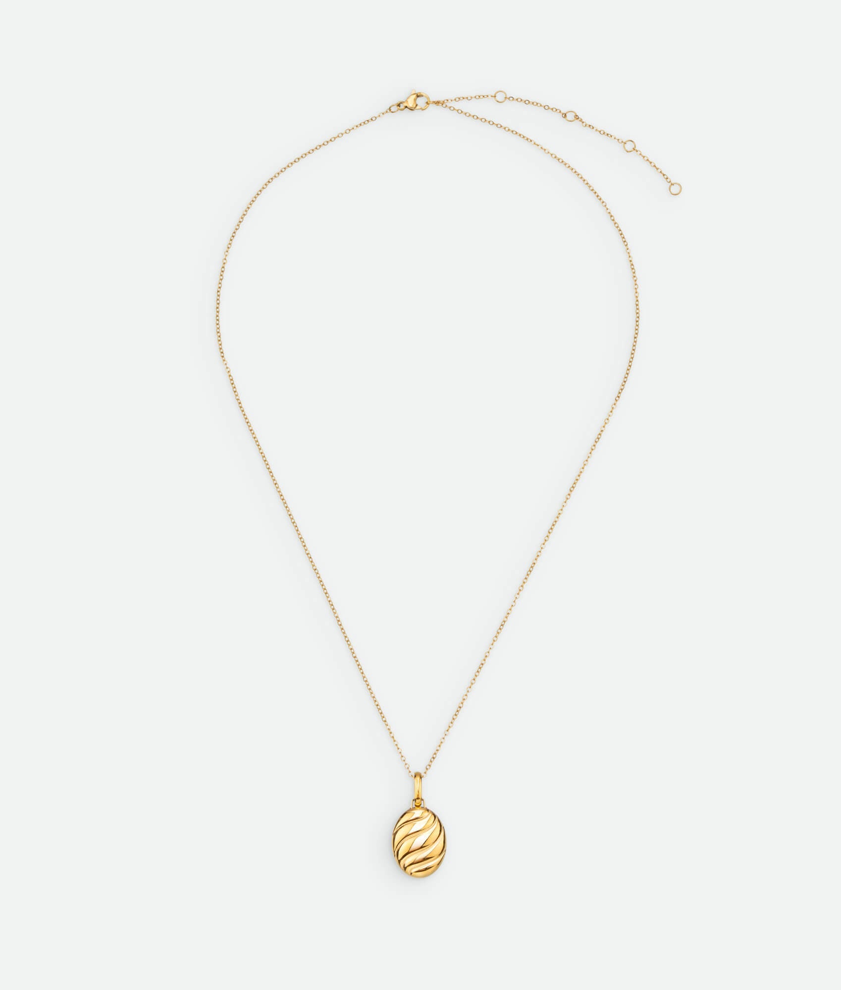 Gold necklace with croissant shaped pendant