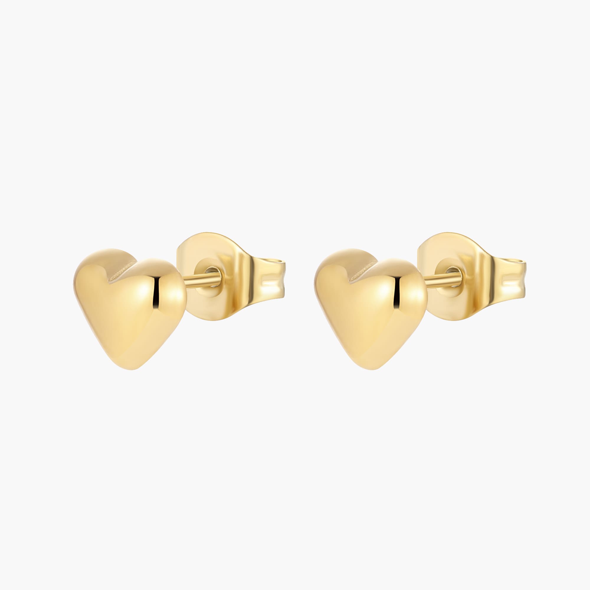 A pair of heart shaped gold earrings