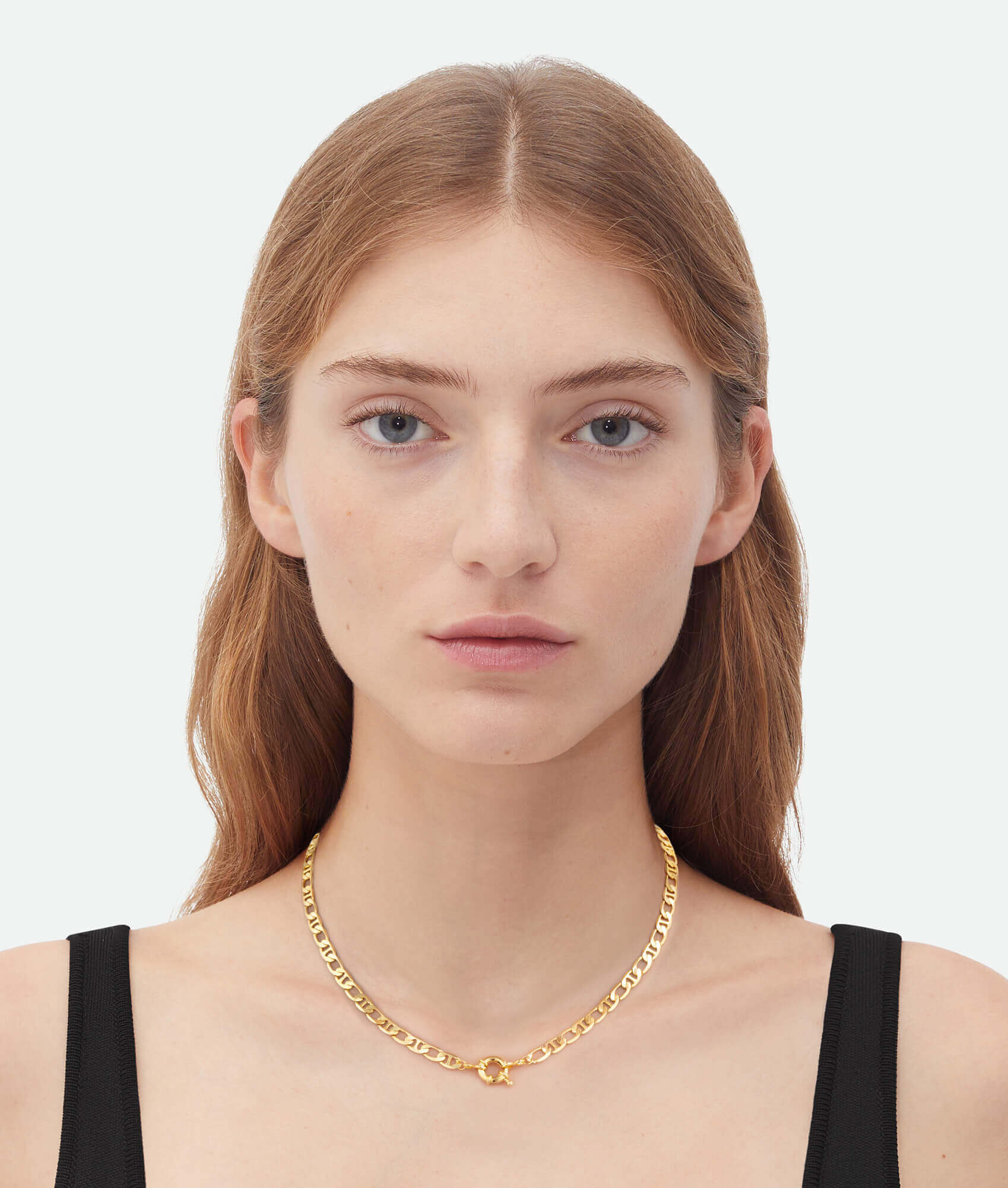 model wearing a Gold link necklace