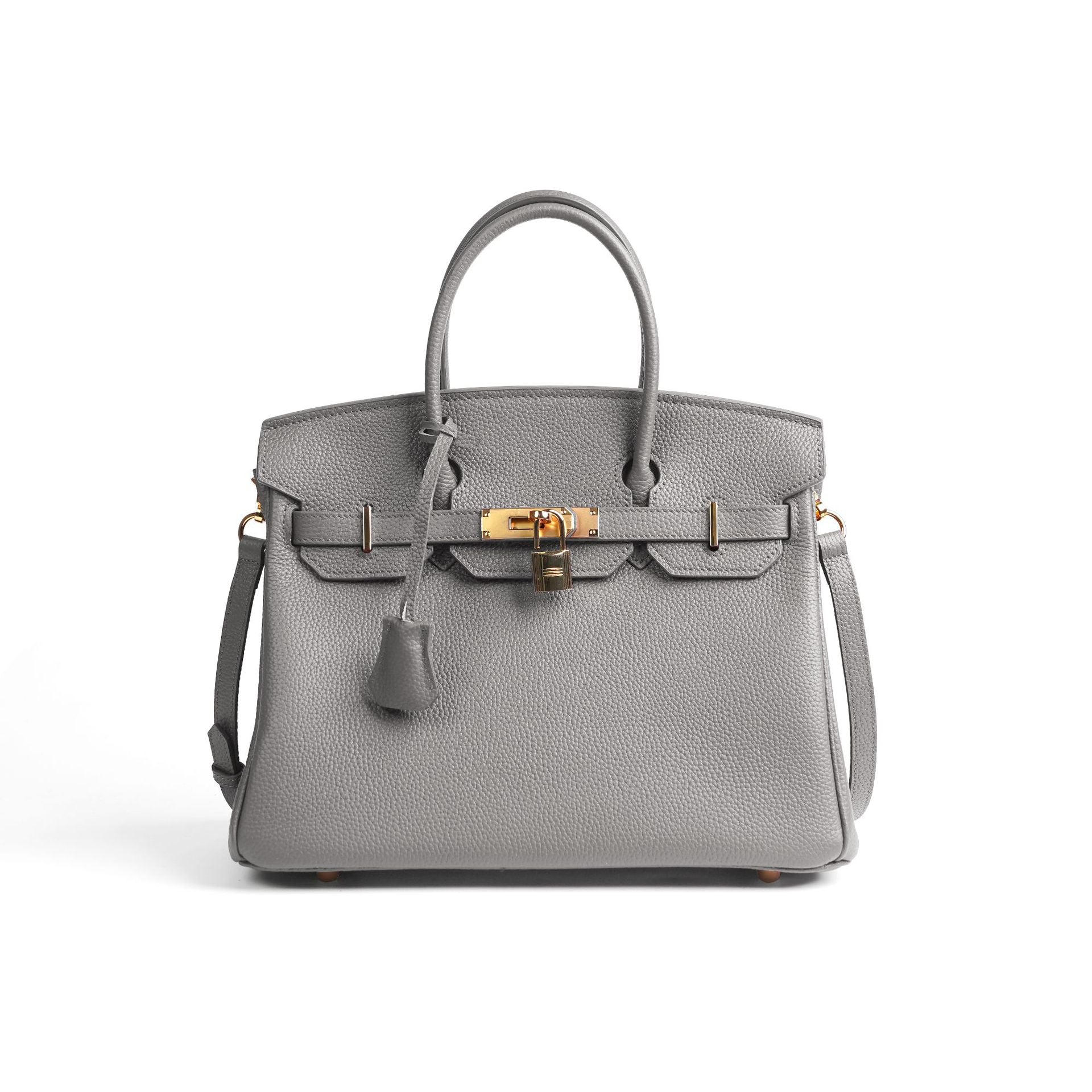 Gray handbag with gold hardware on a white background