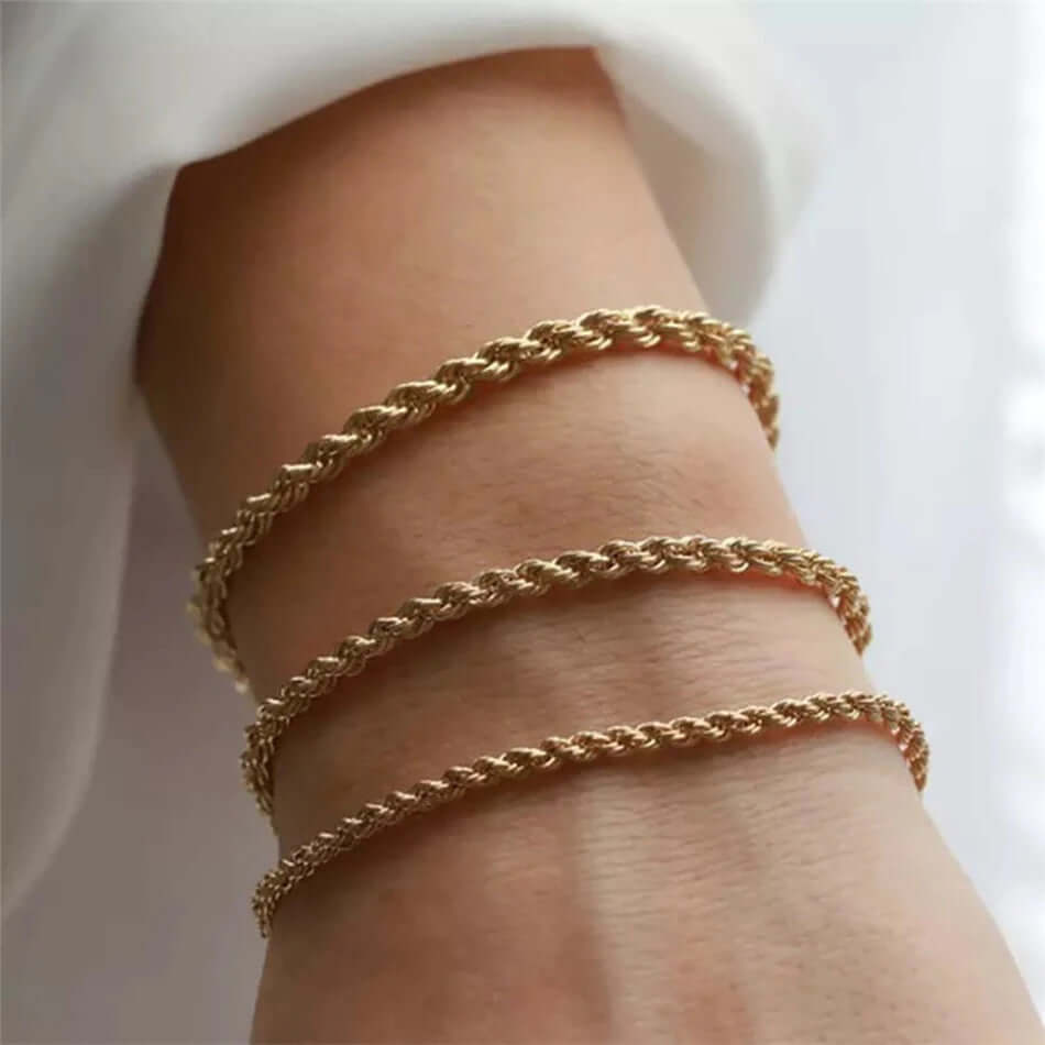 A model wearing Twisted gold Rope Bracelets