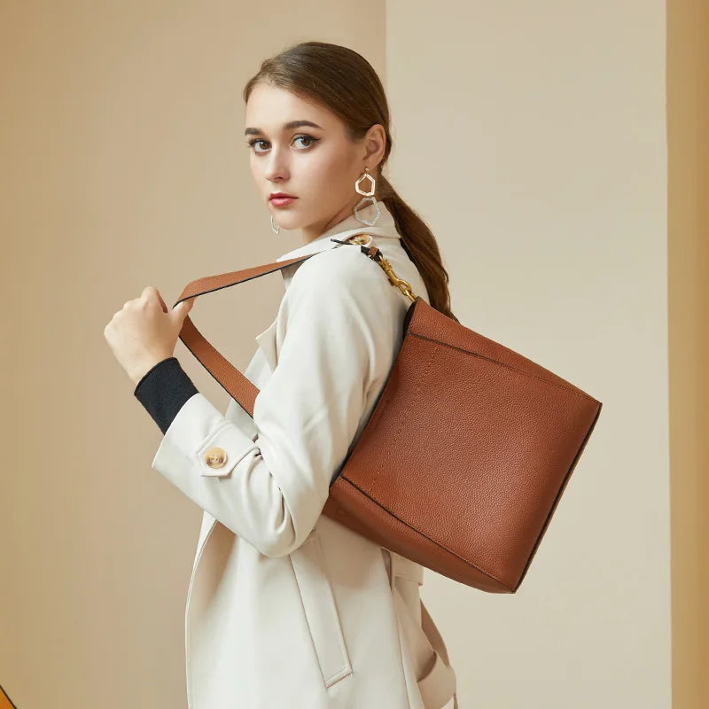 Valentina Ravello bucket bag in Brown, side view