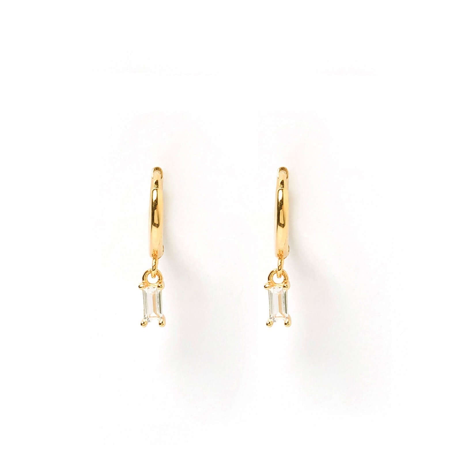 A pair of gold charm earrings