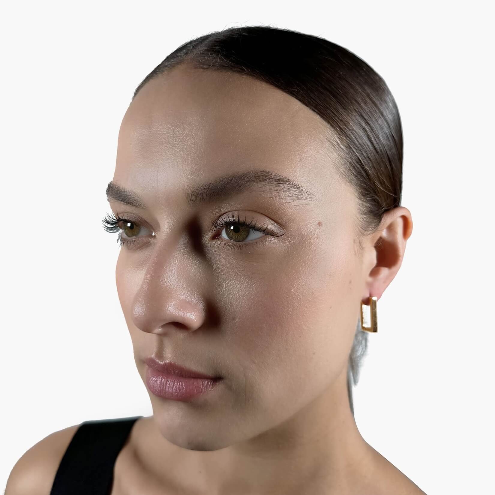 Model wearing Square hoop earrings