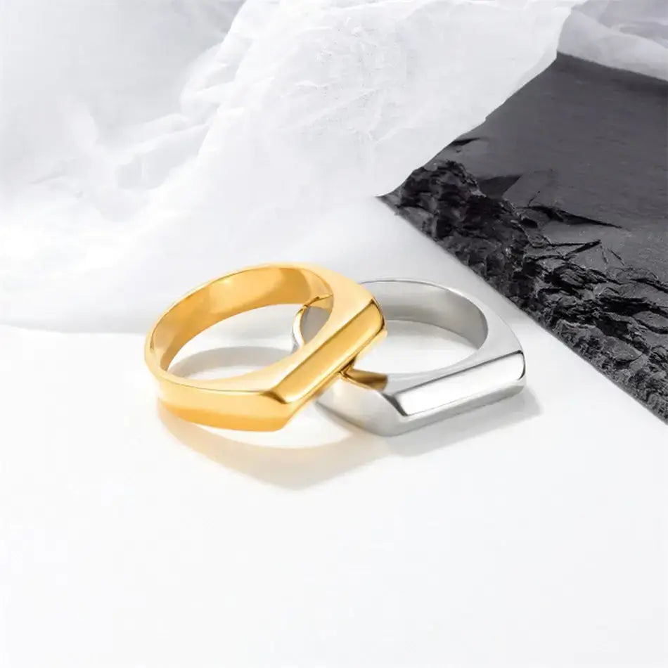 Gold and silver flat bar rings