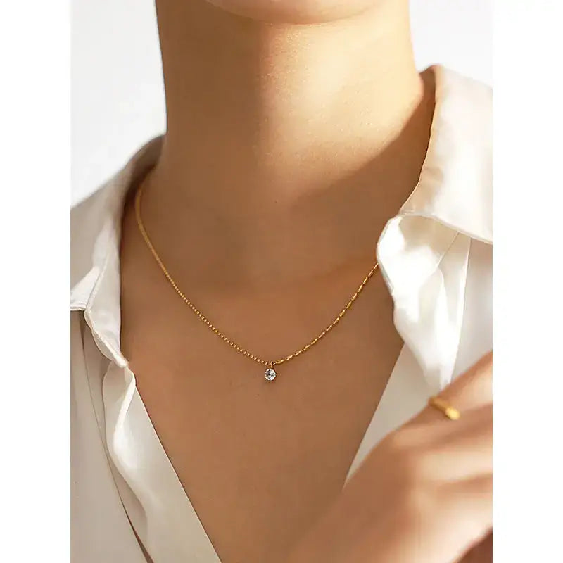 Gold chain necklace with diamond