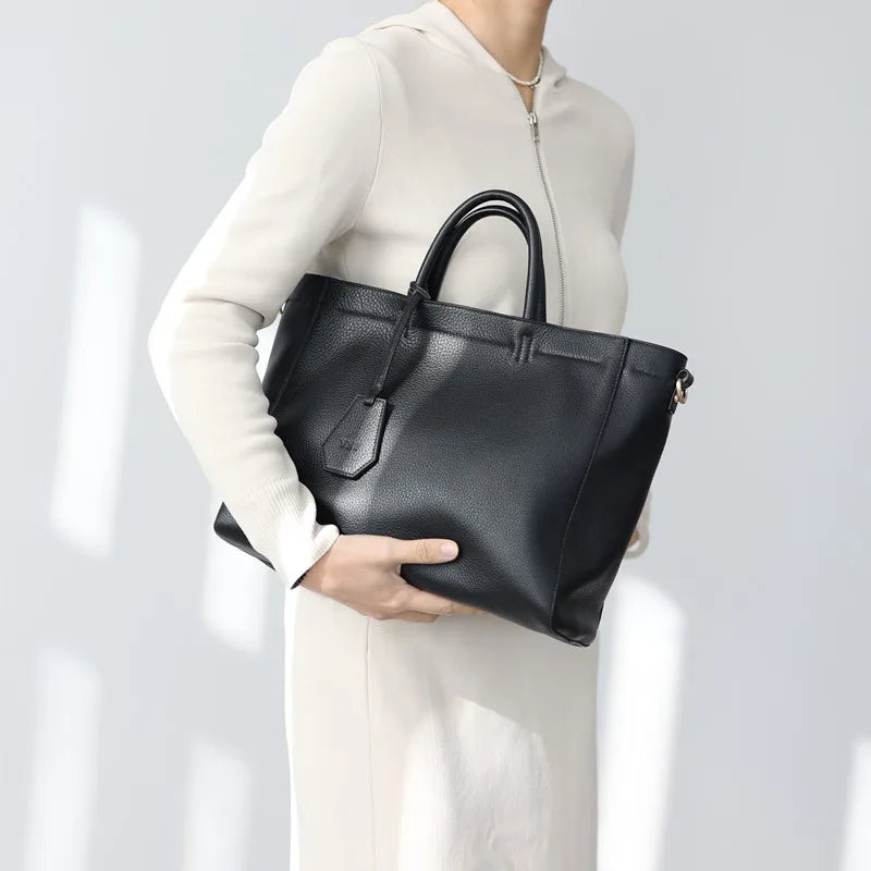 Valentina Torre Large crossbody bag in Elephant Grey, worn