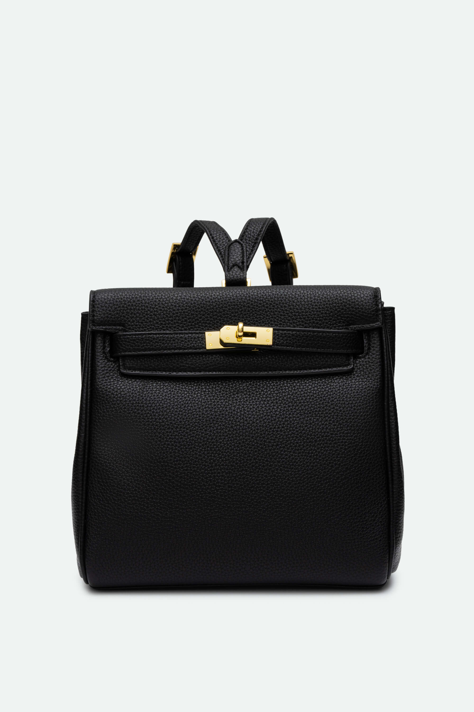 Black backpack with gold hardware on a light gray background