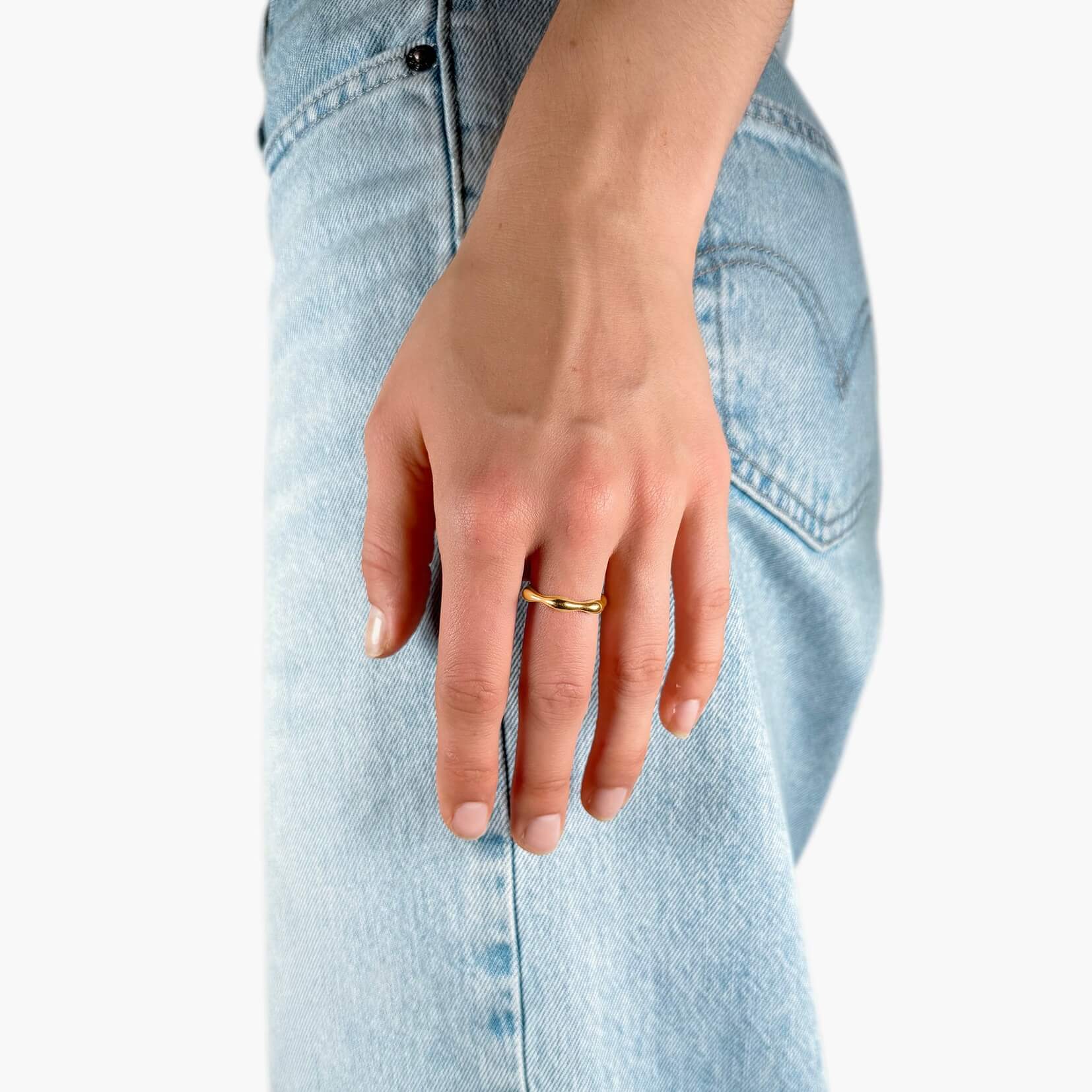 Model wearing Wavy Gold Ring Band