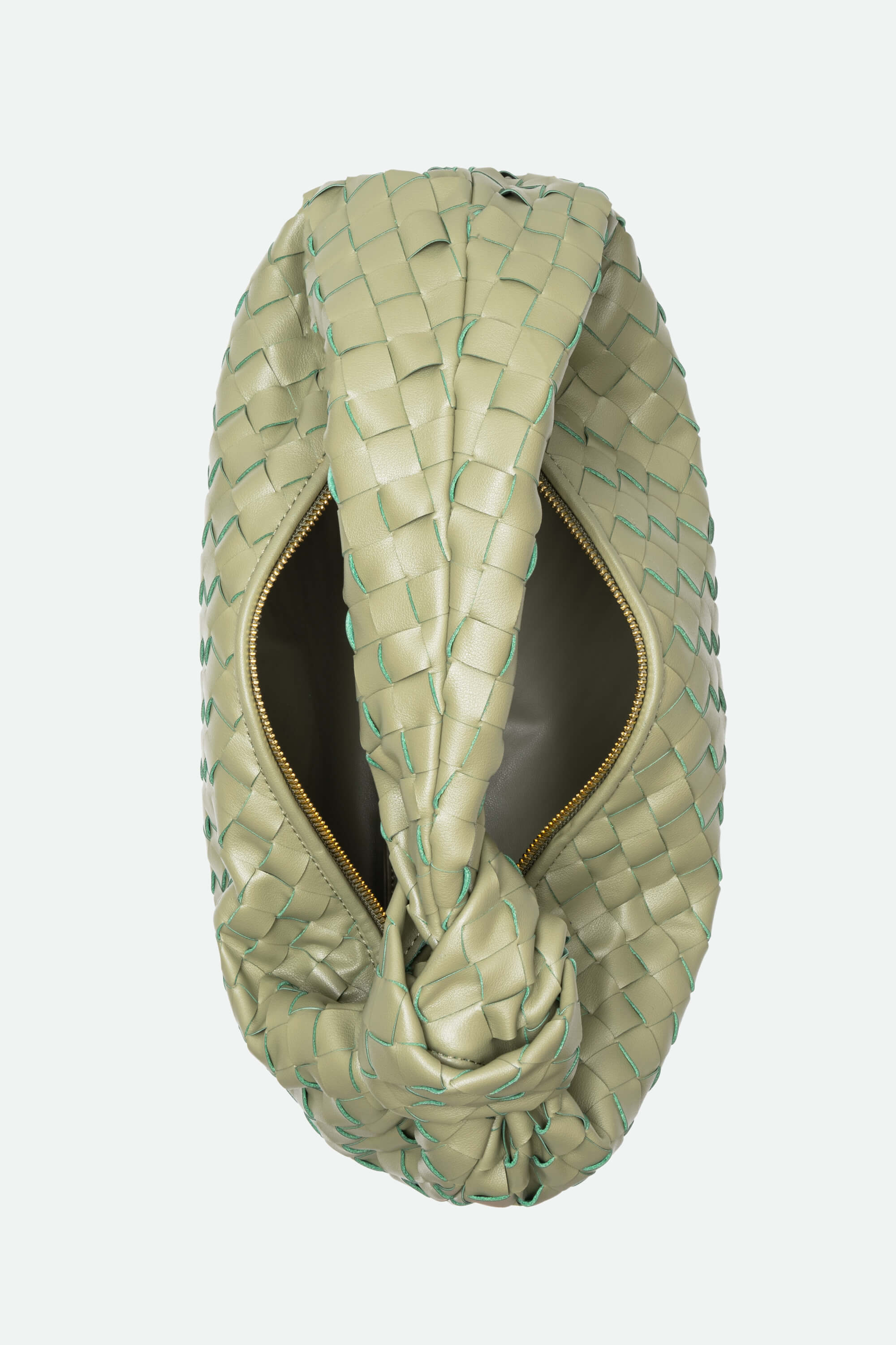 Woven beige headband with a central opening on a light gray background