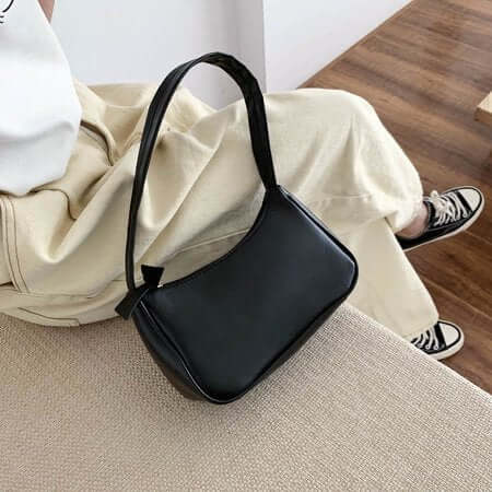 A black mini leather bag