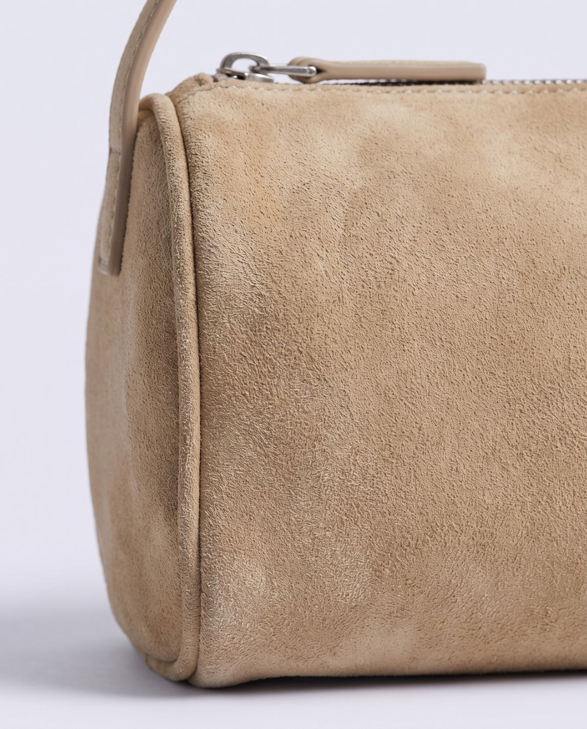 Alba barrel shoulder bag in Beige suede – close-up of the suede texture