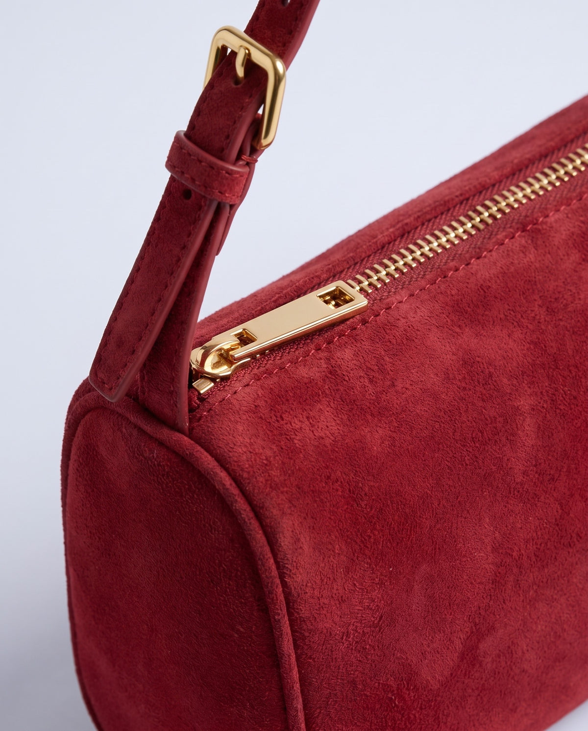 Alba barrel shoulder bag in Red suede – close-up of the suede texture