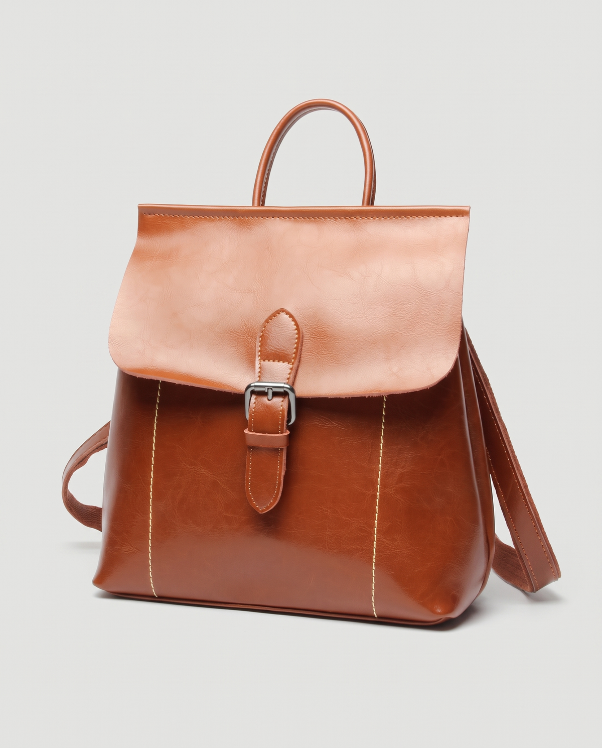 Ambler waxed leather backpack in Brown – three-quarter view