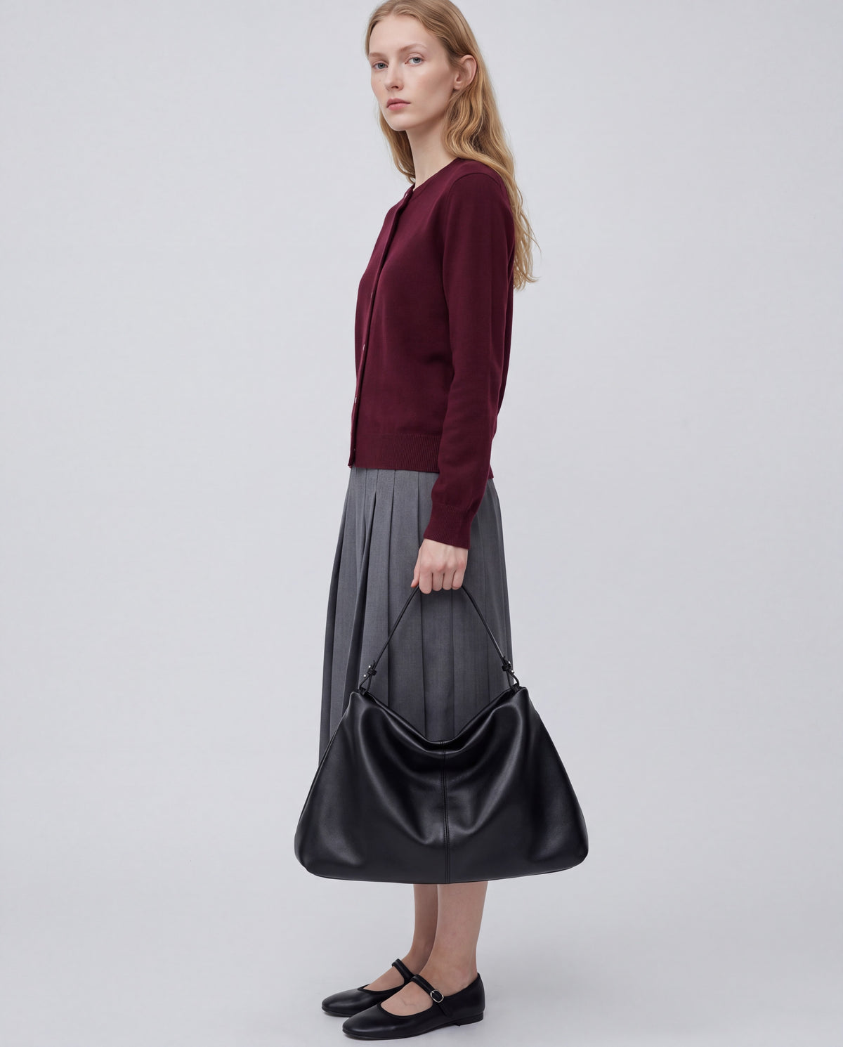 Assisi bag in Black – worn by model, close-up