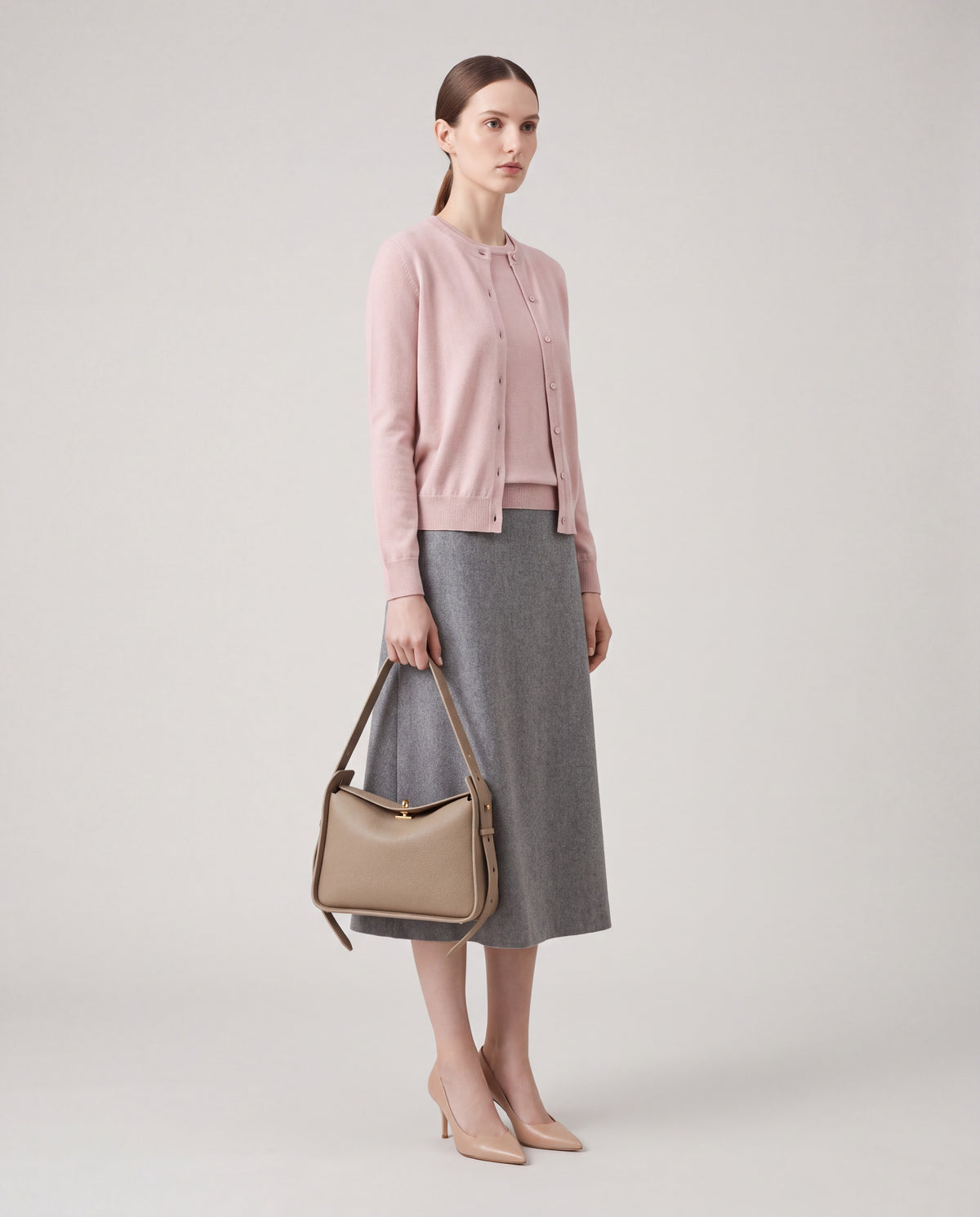 Asti bag in Beige – worn by model, full length