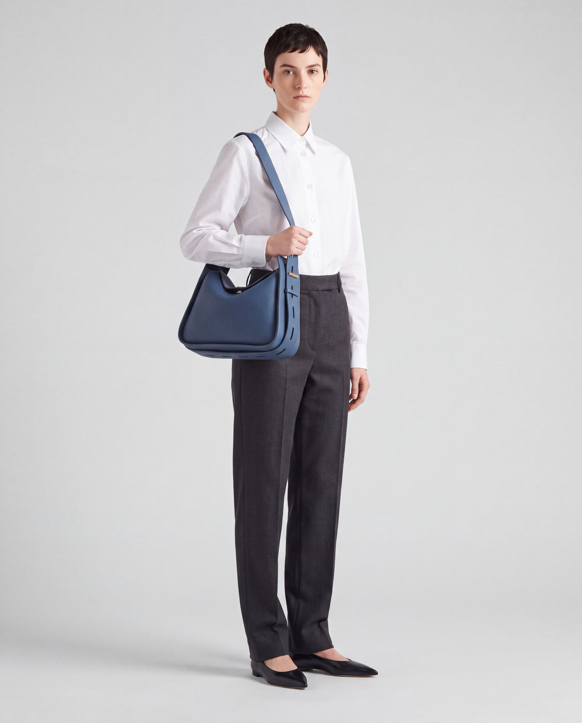 Asti bag in Blue – worn by model, full length