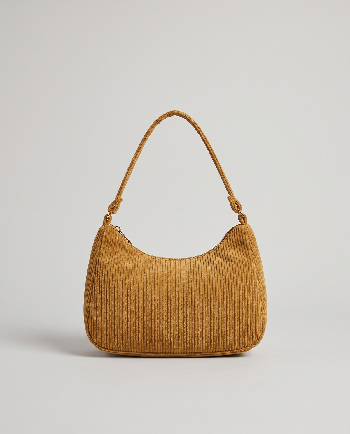 Aura corduroy shoulder bag in Tan – front view