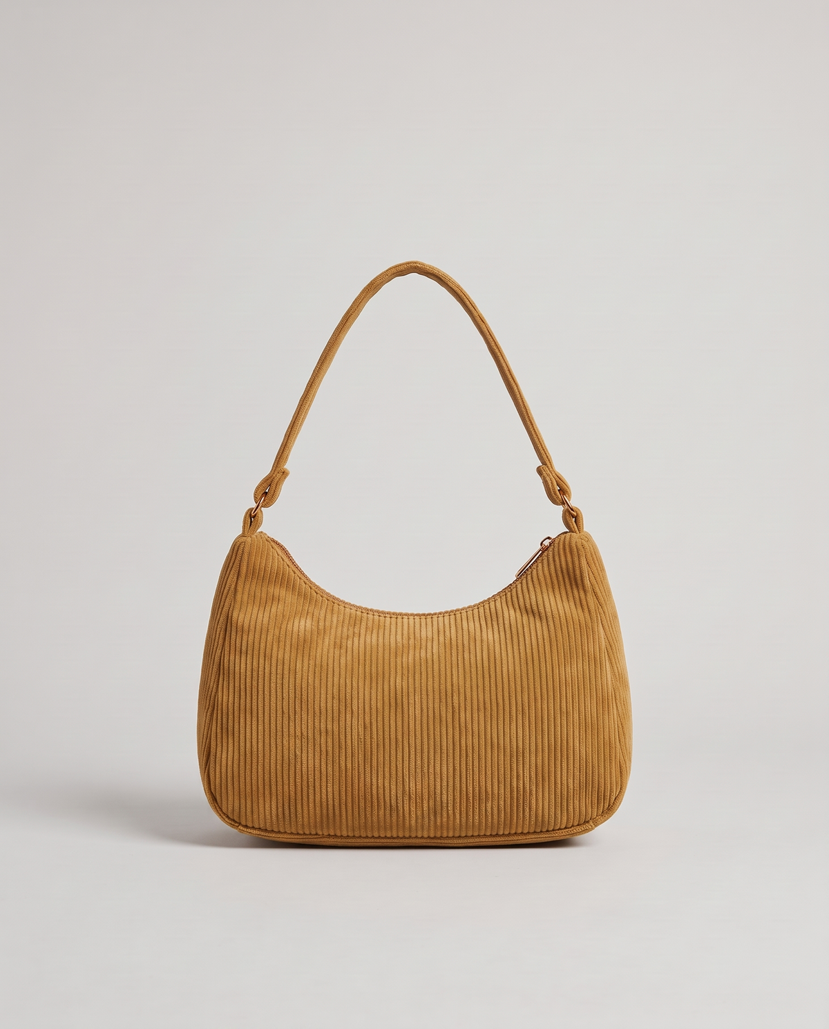 Aura corduroy shoulder bag in Tan – back view