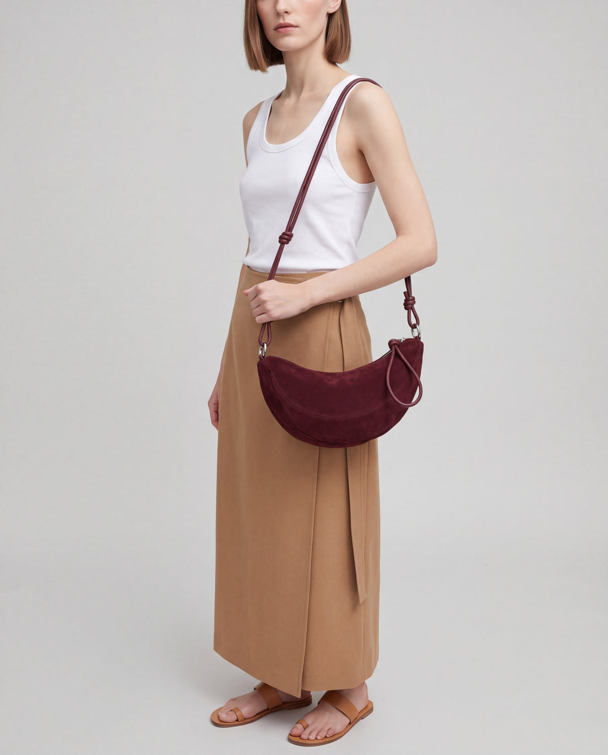 Bruma bag in Burgundy – worn by model, close-up