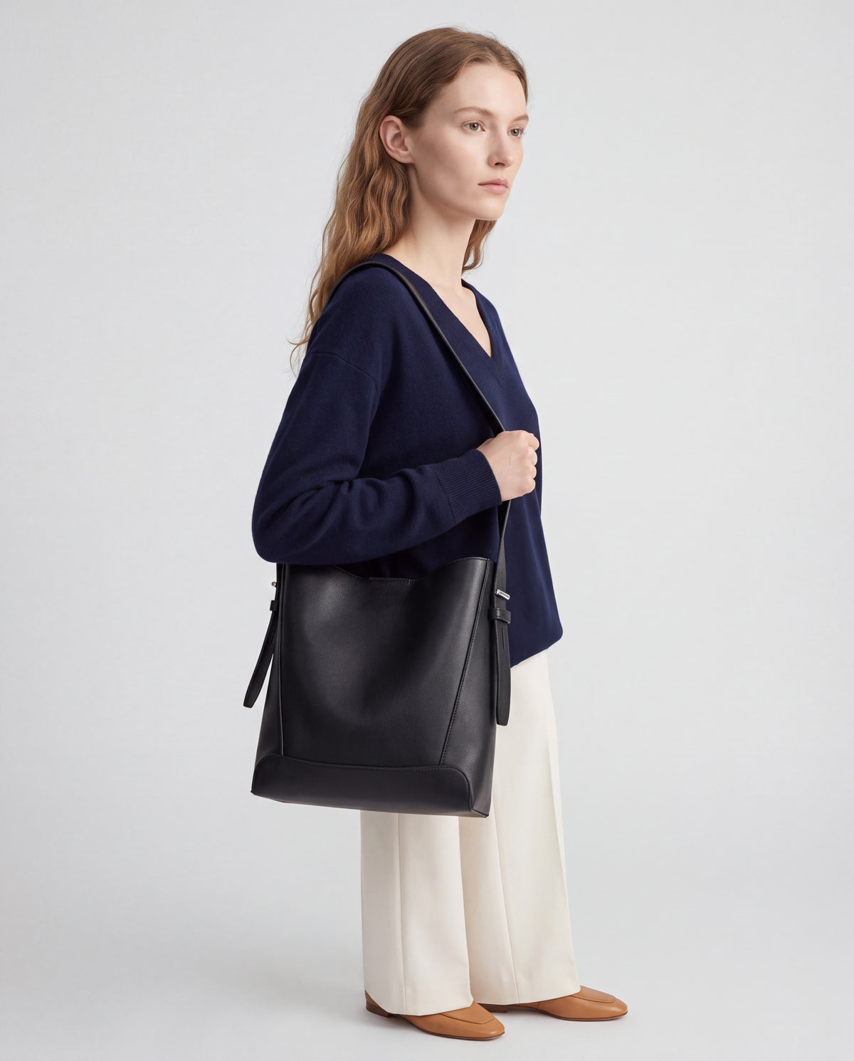 Calce bag in Black – worn by model, close-up