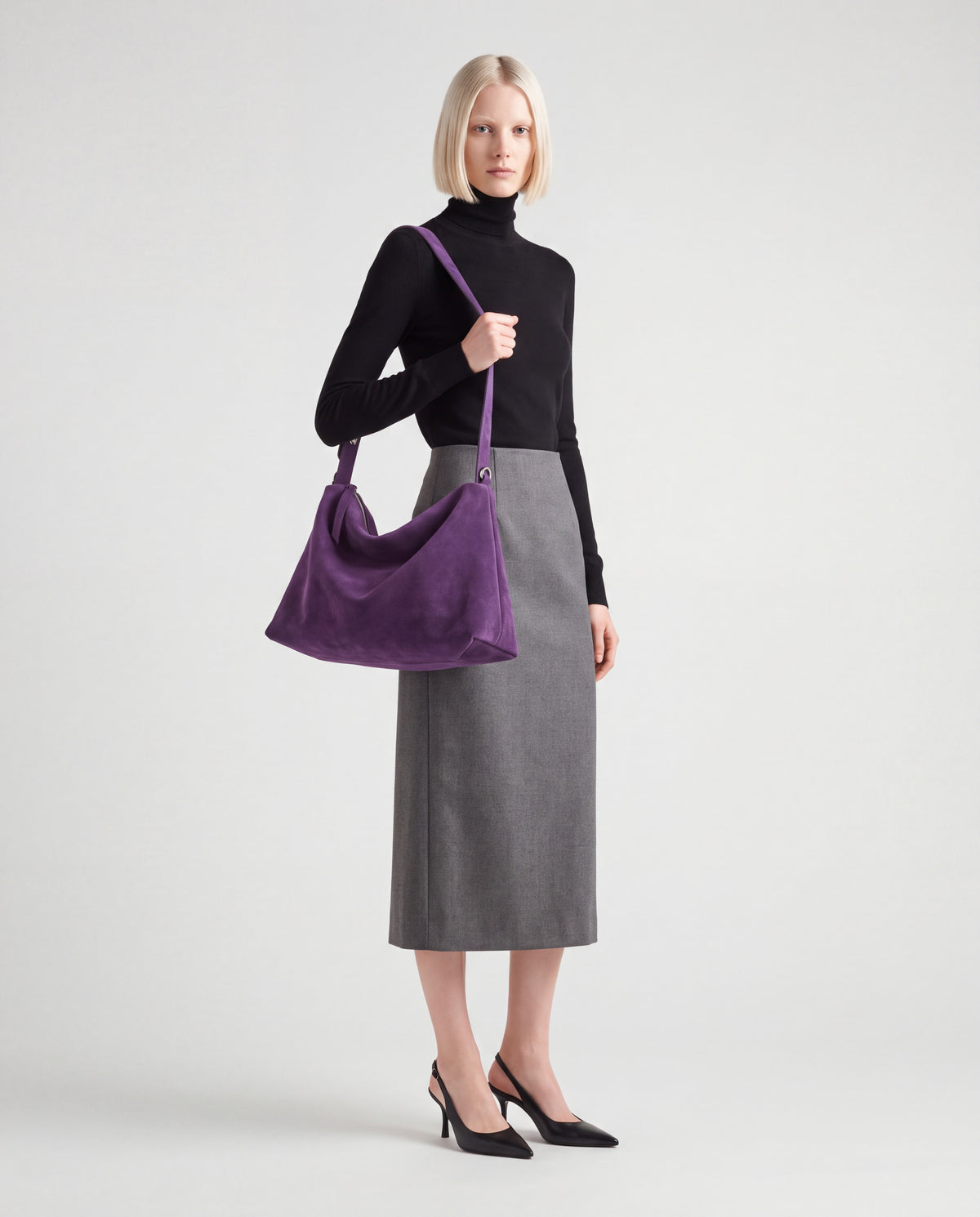 Calma bag in Purple – worn by model, full length