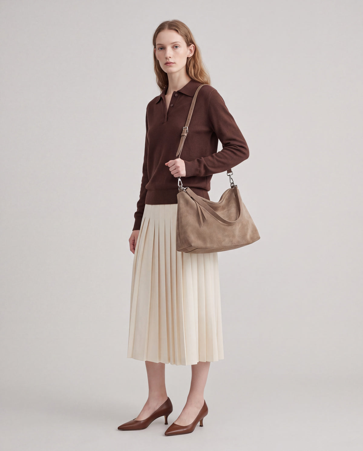 Calma bag in Taupe – worn by model, full length