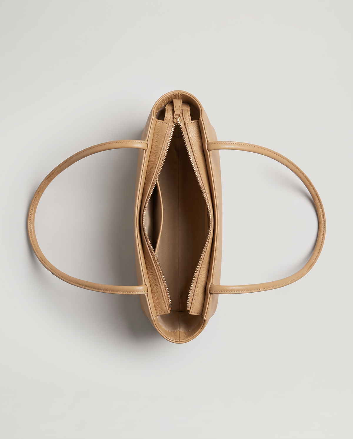Capri leather shoulder bag in tan, open showing interior