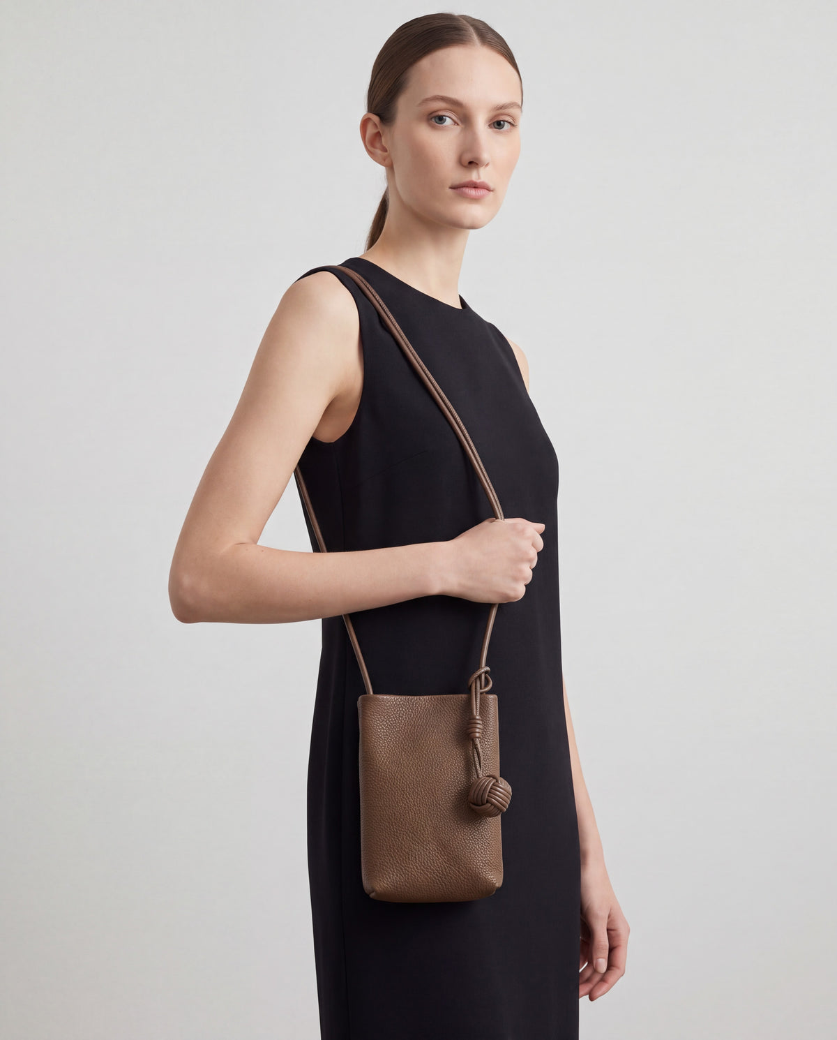 Cara bag in Brown – worn by model, close-up