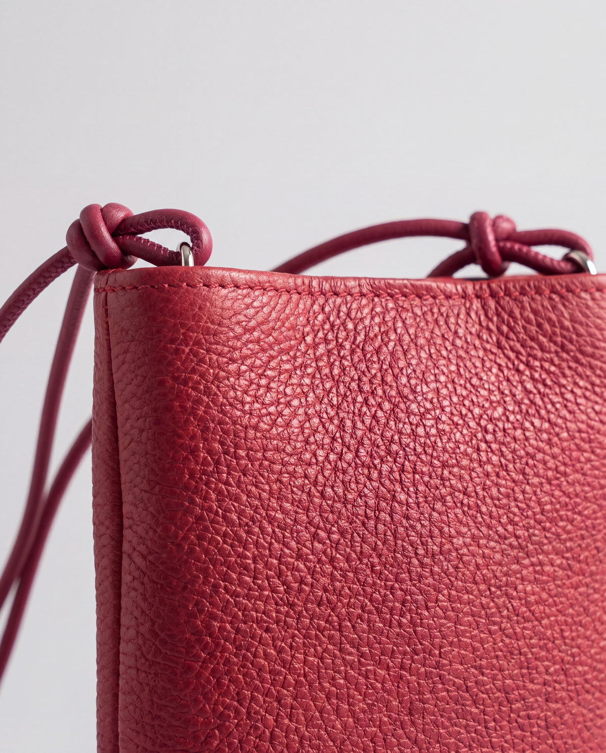 Cara bag in Cherry – leather detail