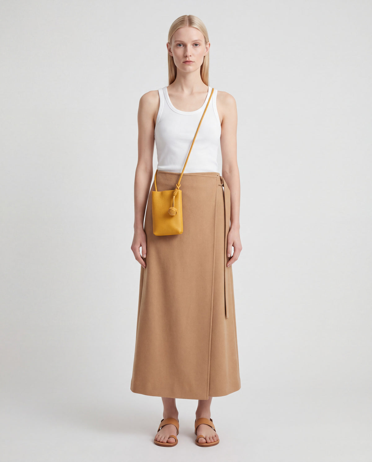 Cara bag in Mustard – worn by model, full length