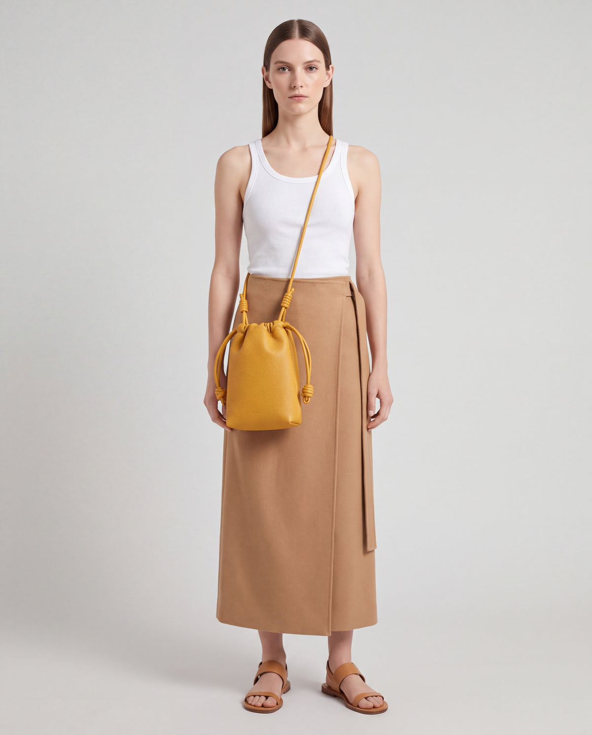 Cara bag in Mustard – worn by model, close-up
