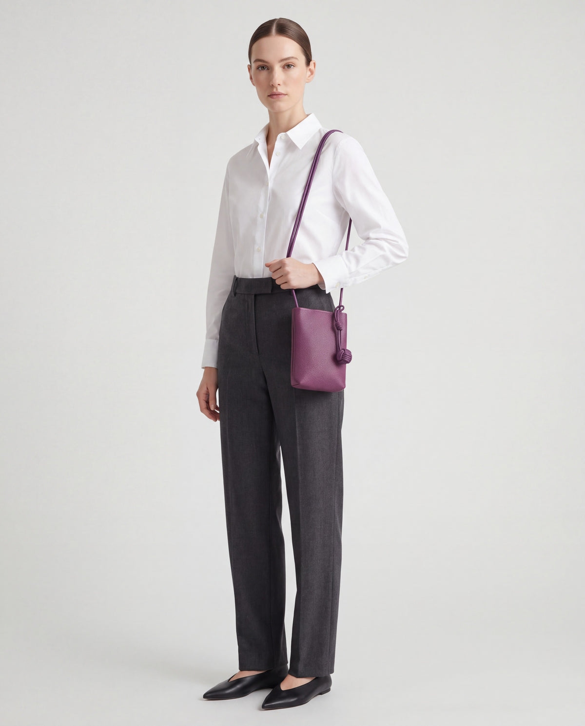 Cara bag in Plum – worn by model, close-up