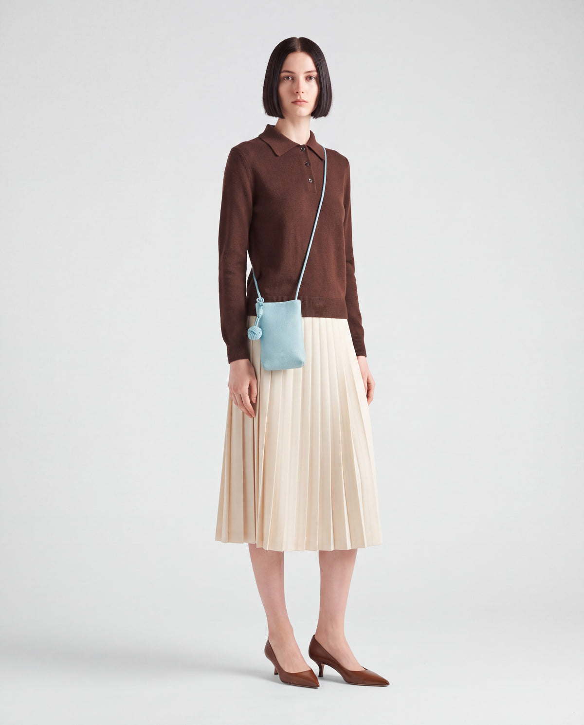 Cara bag in Sky – worn by model, full length