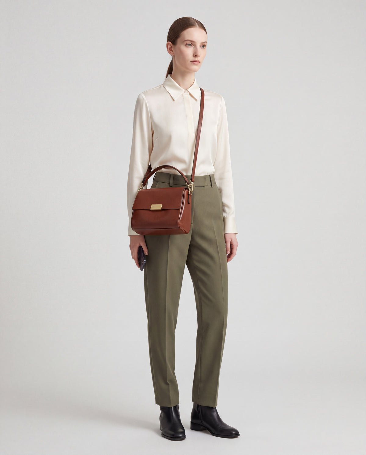Cedro bag in Brown – worn by model, full length