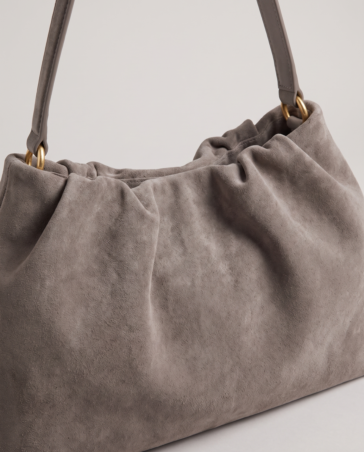 Cielo gathered suede bag in taupe, hardware and leather detail