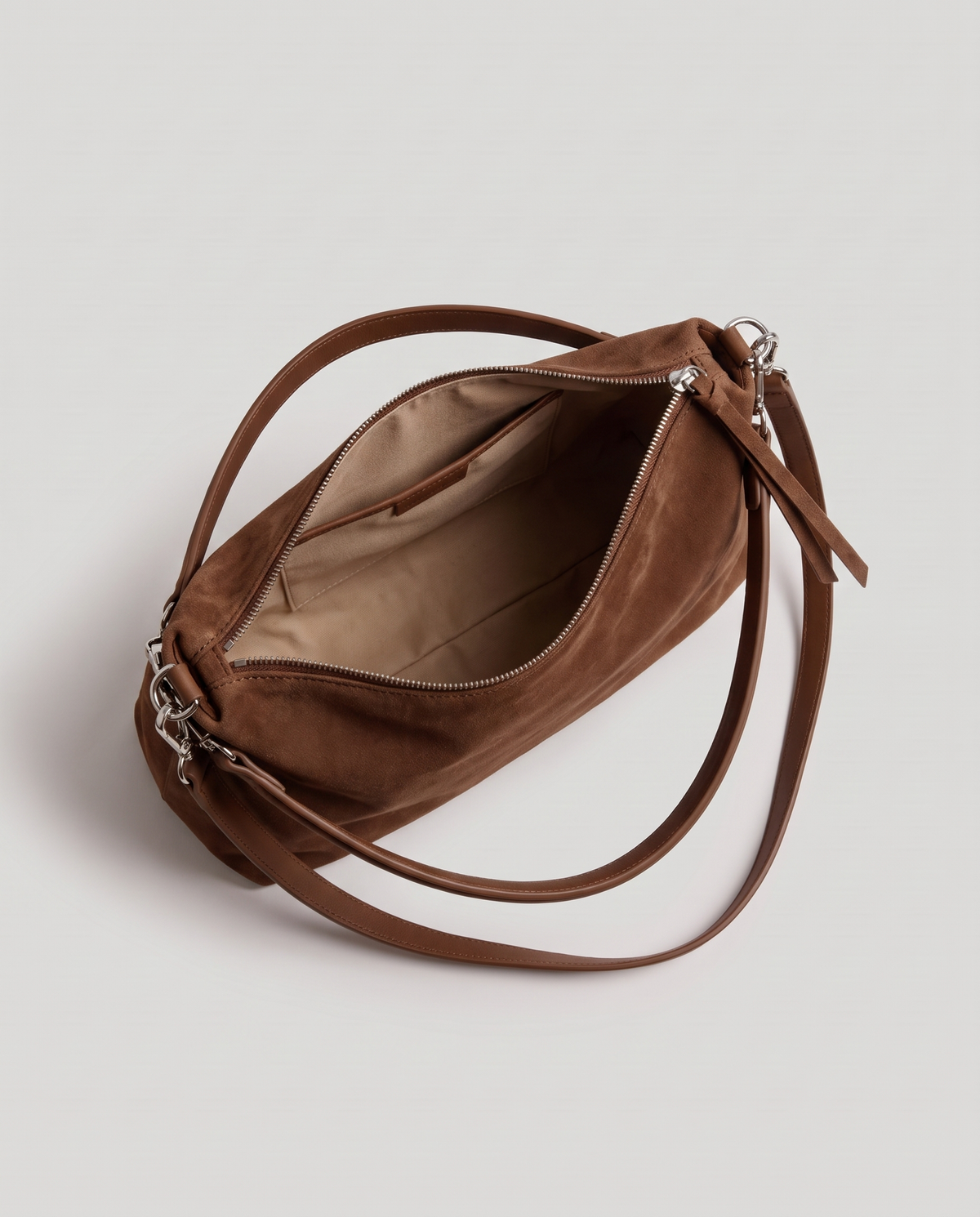 Cima suede shoulder bag in chocolate, open showing interior