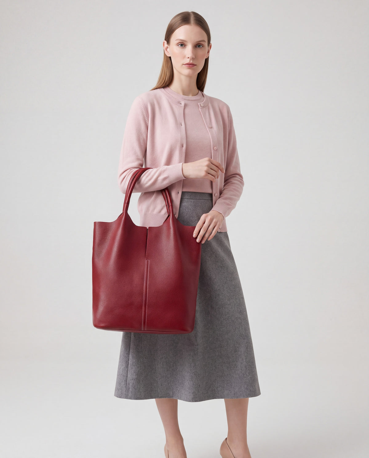 Commute bag in Burgundy – worn by model, close-up