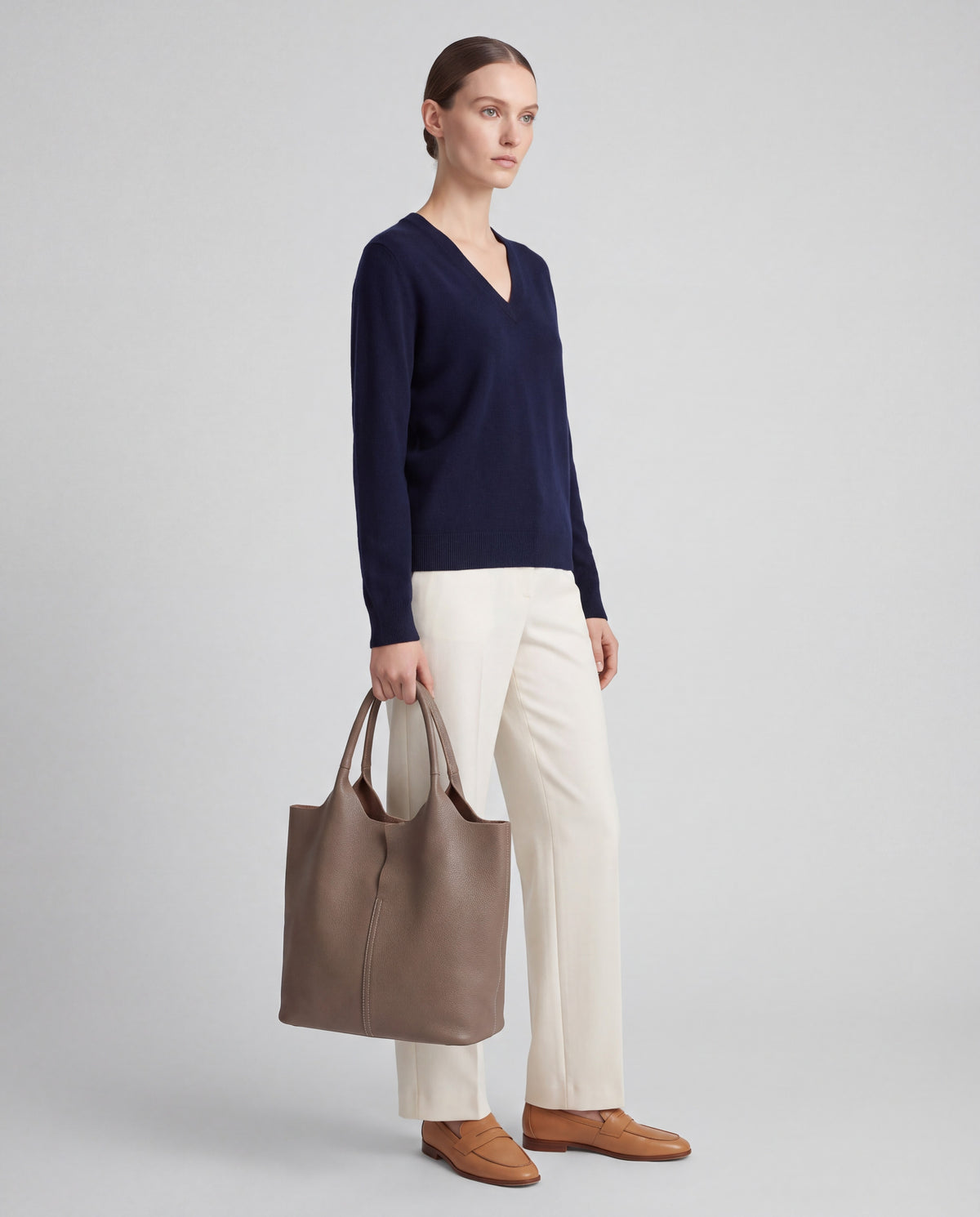 Commute bag in Taupe – worn by model, close-up