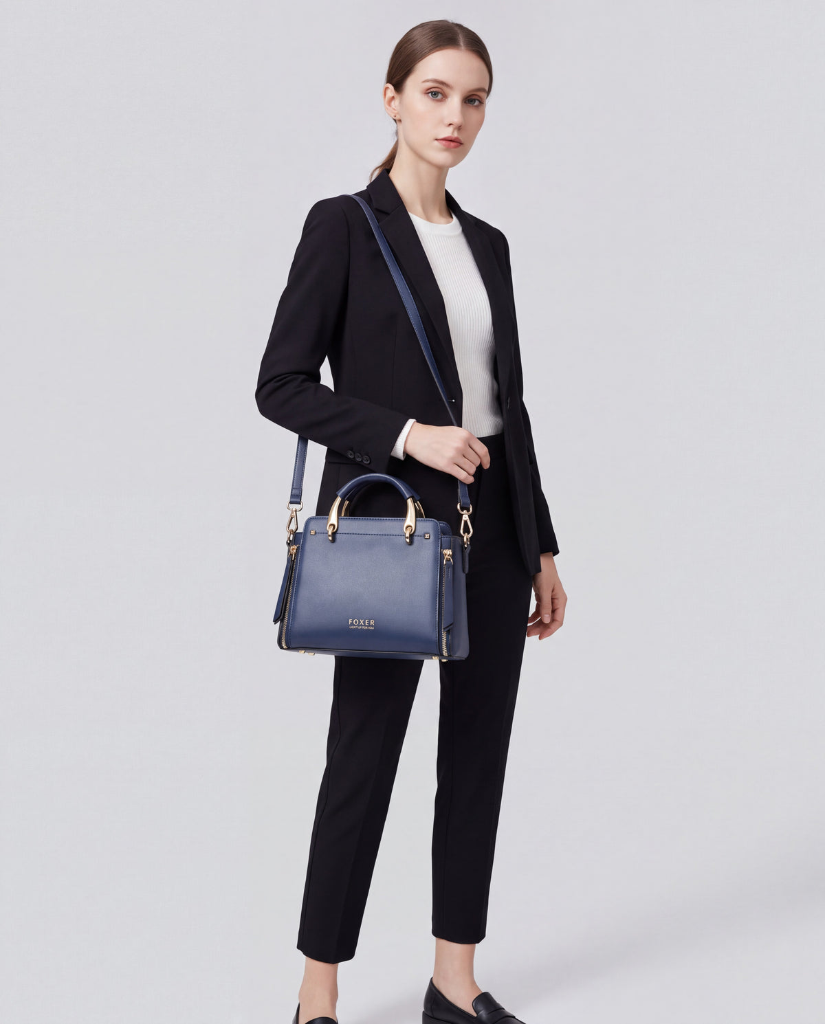 Contrast bag in Blue – worn by model, close-up