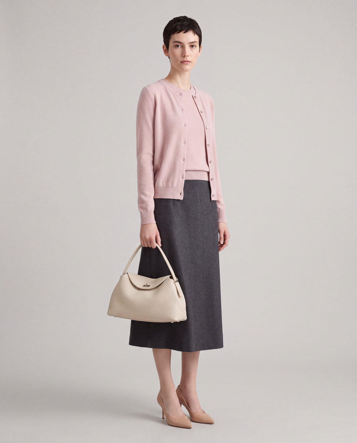 Corda bag in Cream – worn by model, full length