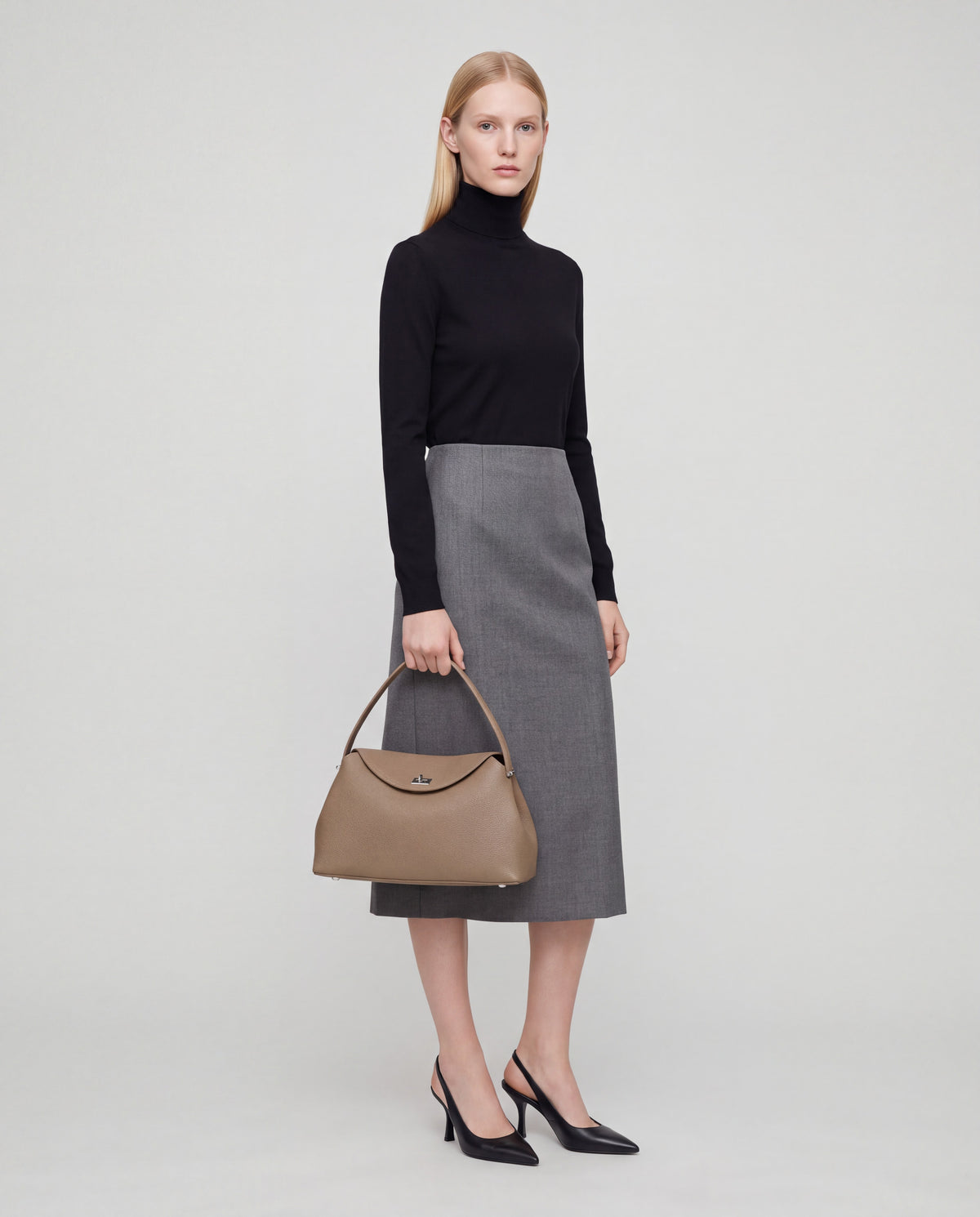 Corda bag in Taupe – worn by model, full length